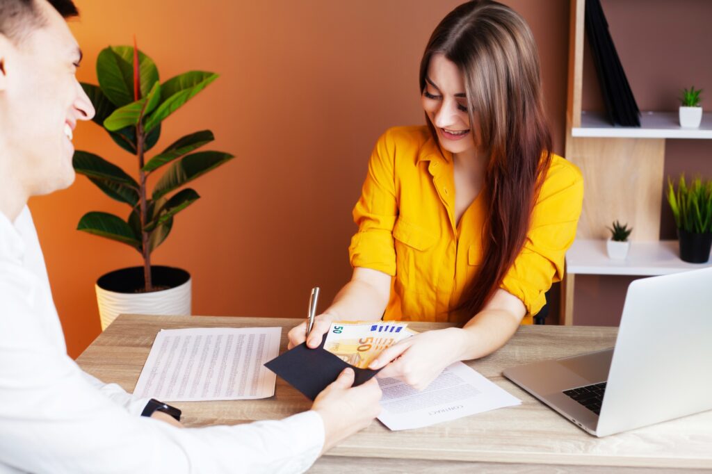 Employee Is Given A Bribe For Signing A Contract